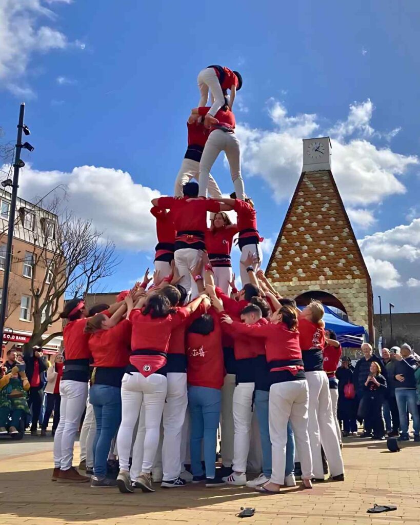 castellers creating a castell in the blue market